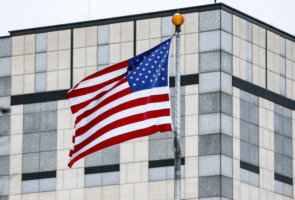 A flag waves in the wind at a U.S. embassy in a file photo. (Gleb Garanich/Reuters)