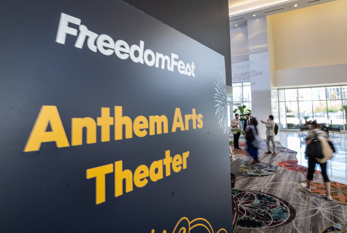 People walk past signs for the Anthem Film Festival at Freedomfest in Las Vegas, on July 9, 2026. (John Fredricks/The Epoch Times)