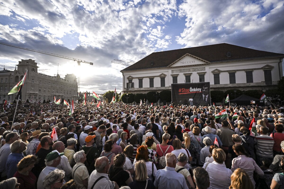 Former Hungarian President Janos Ader, (C), speaks - during a protest held by Fidesz and KDNP against the amendment of the Basic Law - in front of the presidential Alexander Palace in Budapest, Hungary, on July 9, 2026. (Tibor Illyes/MTI via AP)