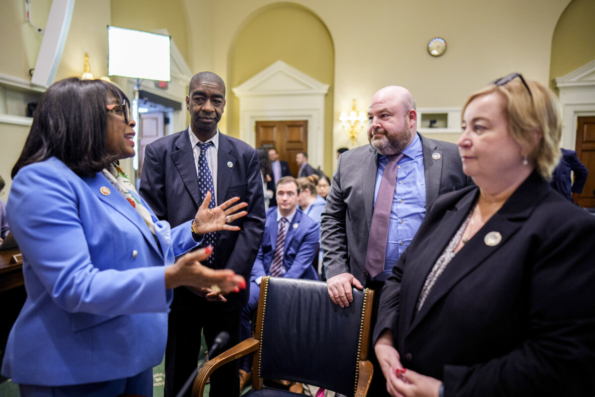 U.S. Election Assistance Commission Chairman Thomas Hicks, second from left; U.S. Election Assistance Commission Commissioner Benjamin Hovland, second from right; and U.S. Election Assistance Commission Vice Chair Christy McCormick, right, speak with Rep. Terri Sewell (D-Ala.) in Washington on May 20, 2026. (Andrew Harnik/Getty Images)
