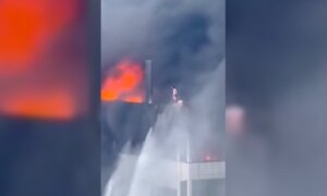 Deadly Fire Traps Workers on Roof in China