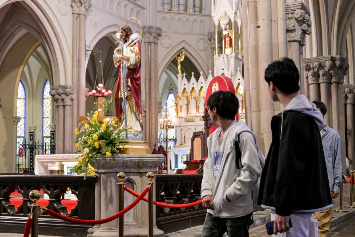 People visit the Saint Ignatius Cathedral in Shanghai's Xuhui district on April 22, 2025. (Hector Retamal/AFP via Getty Images)