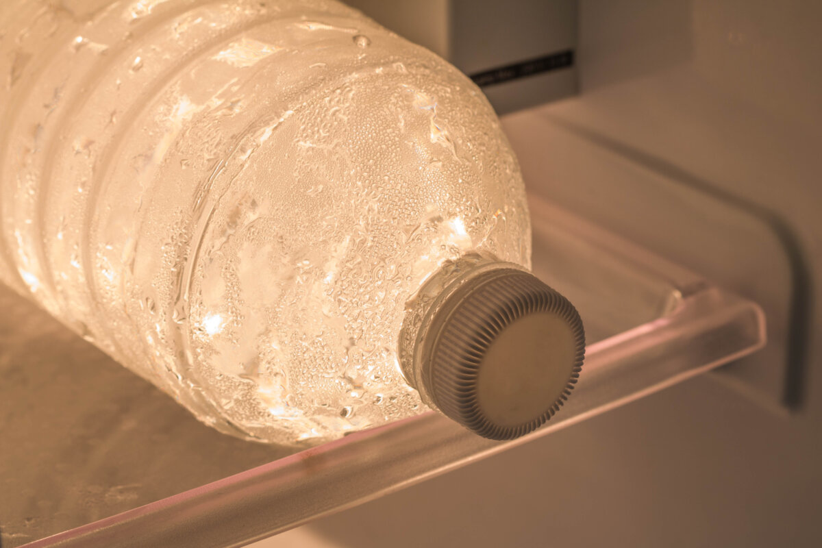 Frozen water bottles keep food cold for hours and gradually thaw into cold drinking water. That's two jobs for one item, which is always my favorite kind of frugal solution. (mr.kriangsak kitisak/Shutterstock)
