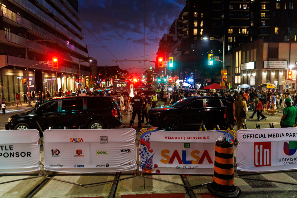 Police respond to a shooting at the Salsa on St. Clair event in Toronto, on July 11, 2026. (The Canadian Press/Keito Newman)