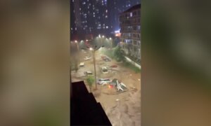 Eyewitness Captures Cars Washed Away in China