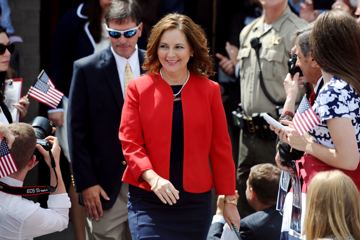Darline Graham Nordone, sister of Sen. Lindsey Graham (R-S.C.), walks to the stage before his announcement for presidency on June 1, 2015, in Central, S.C. (Rainier Ehrhardt/AP Photo)