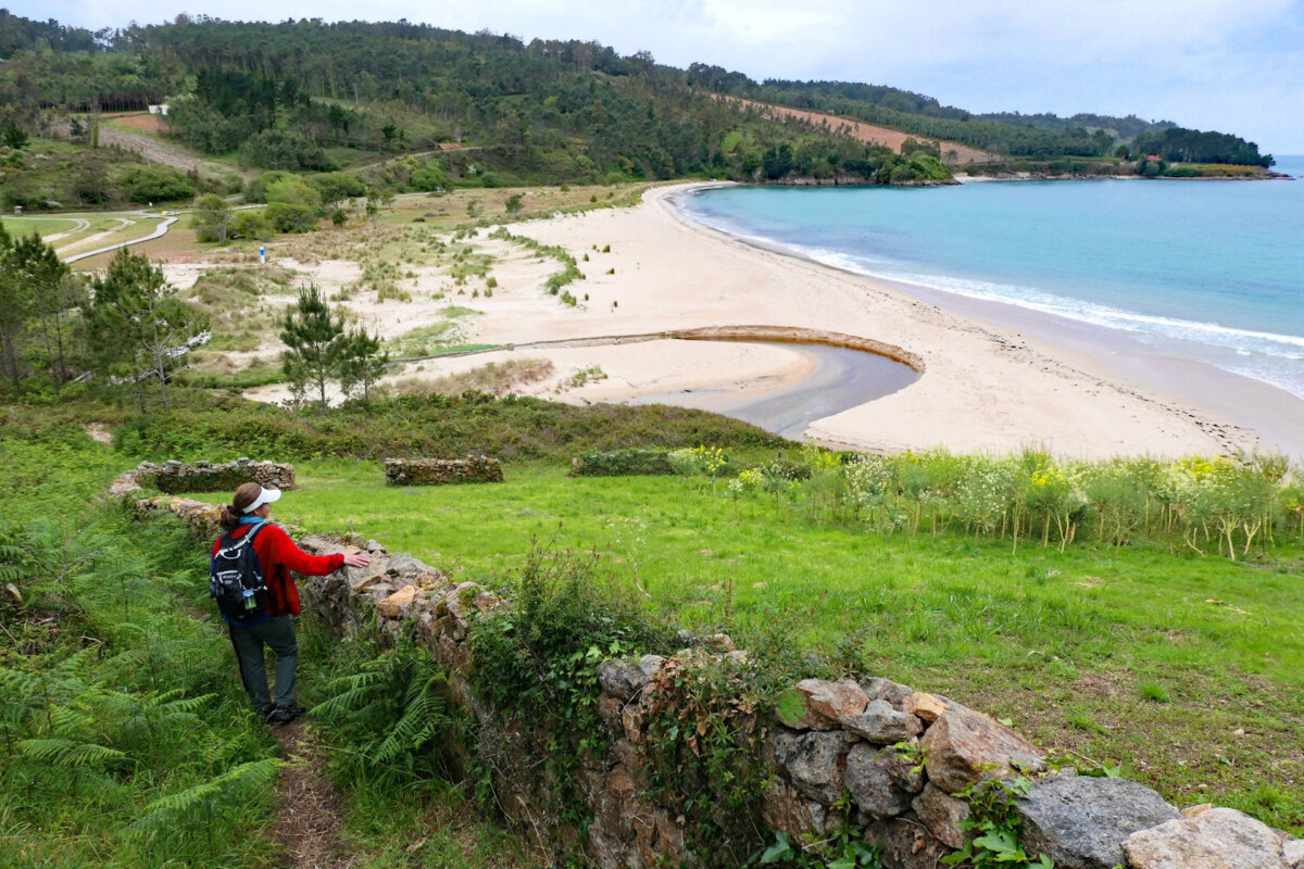 A hiker overlooks the beach in Finisterre, Spain. (Doug Hansen)