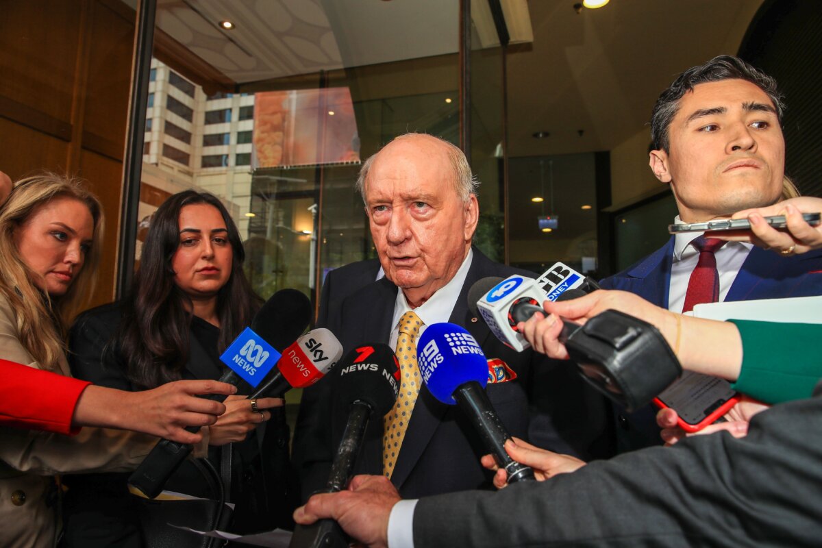Former veteran radio broadcaster and conservative commentator Alan Jones speak to the media outside the Sydney’s Downing Centre Local Court in Sydney, Australia, on Dec. 18, 2024. (Roni Bintang/Getty Images)