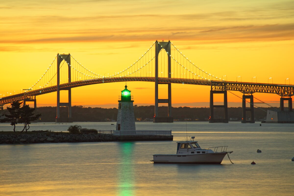 New Harbour Light and Claiborne Pell Newport Bridge at sunset, in Newport, Rhode Island, in a file photo. (Fotogro/Shutterstock)