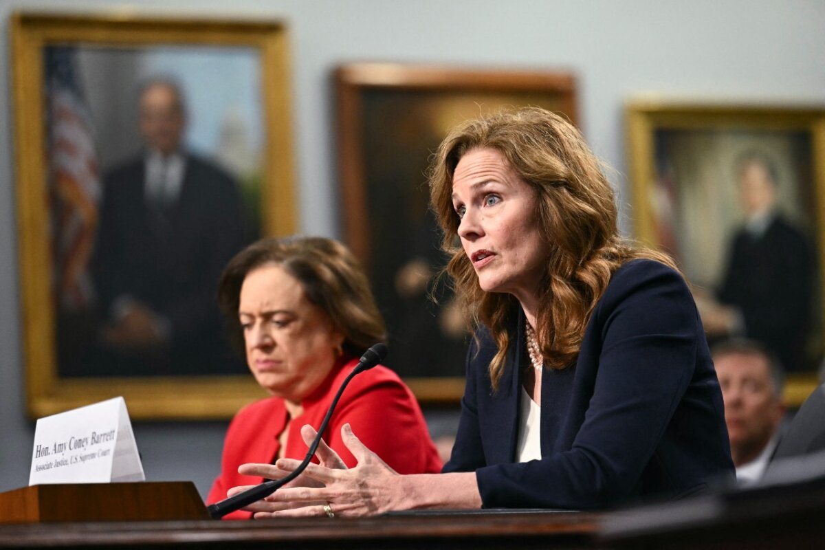 Supreme Court Justices Elena Kagan (L) and Amy Coney Barrett testify during a House Appropriations Subcommittee on Financial Services hearing on Capitol Hill on July 14, 2026. (Kent Nishimura/AFP via Getty Images)