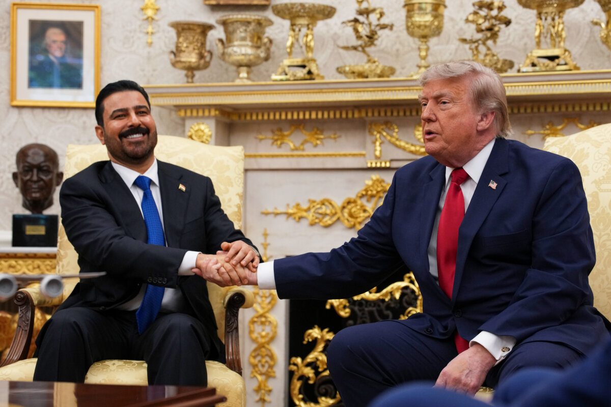 U.S. President Donald Trump (R) shakes hands with Iraqi Prime Minister Ali al-Zaidi during a bilateral meeting in the Oval Office of the White House on July 14, 2026. (Andrew Harnik/Getty Images)