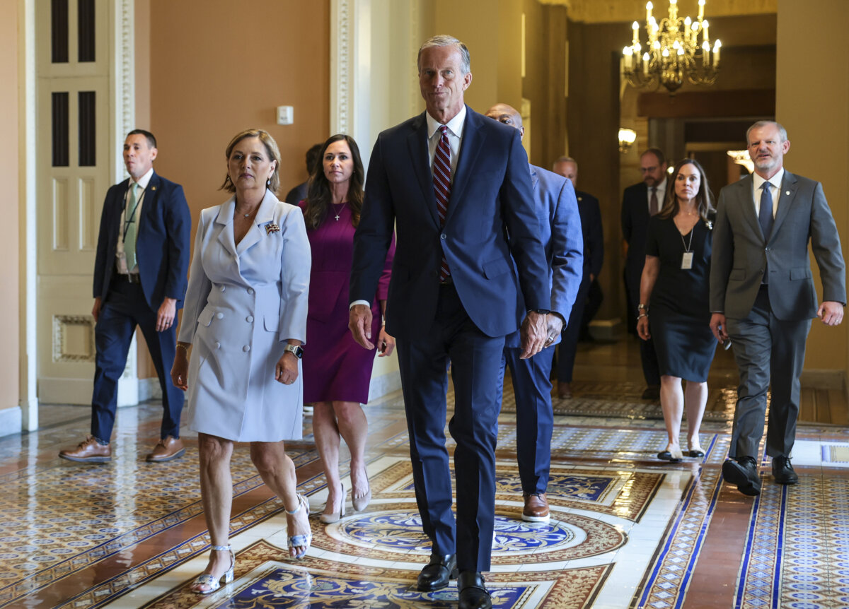 Darline Graham Nordone (L) arrives to be sworn in with U.S. Senate Majority Leader John Thune (R-SD) (C) at the U.S. Capitol in Washington, on July 14, 2026. Nordone was appointed by South Carolina Gov. Henry McMaster following the death of her brother, U.S. Sen. Lindsey Graham. (Anna Moneymaker/Getty Images)