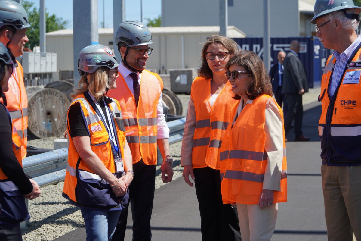 New York Gov. Kathy Hochul tours the Astoria neighborhood of the borough of Queens, New York City, power transfer station where the Champlain Hudson Power Express enters New York City, on June 16, 2026. (Nicholas Zifcak/The Epoch Times)
