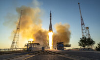 Day in Photos: Soyuz ISS Launch, France Bastille Day Parade, and Van Collision in Chile