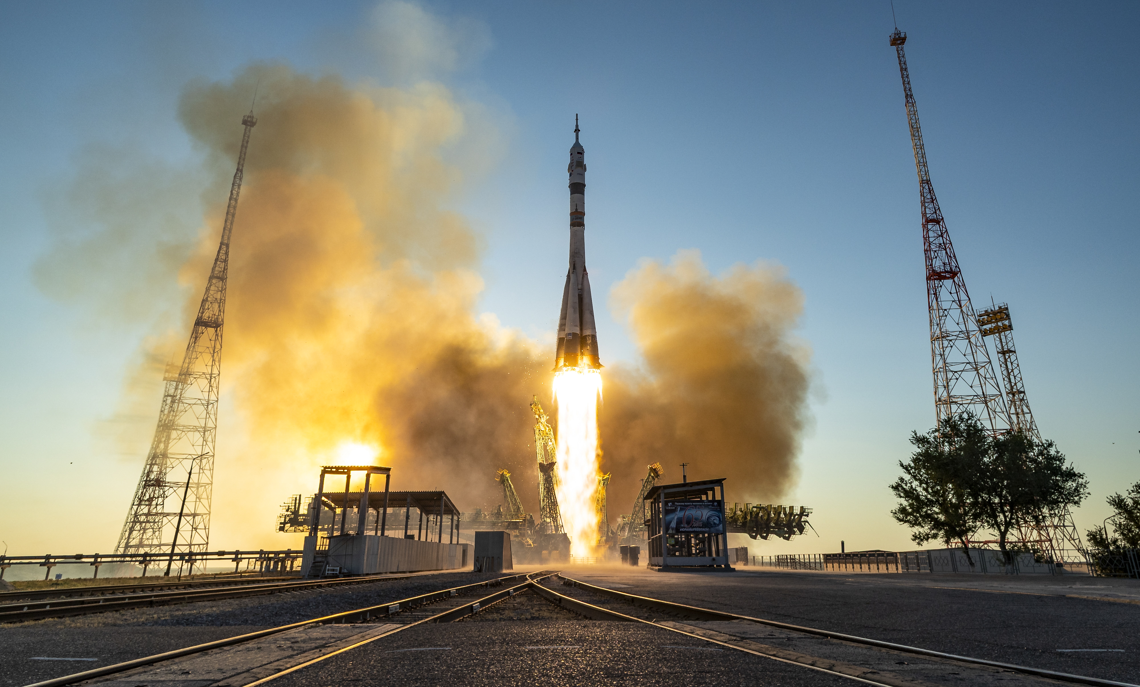 Day in Photos: Soyuz ISS Launch, France Bastille Day Parade, and Van Collision in Chile
