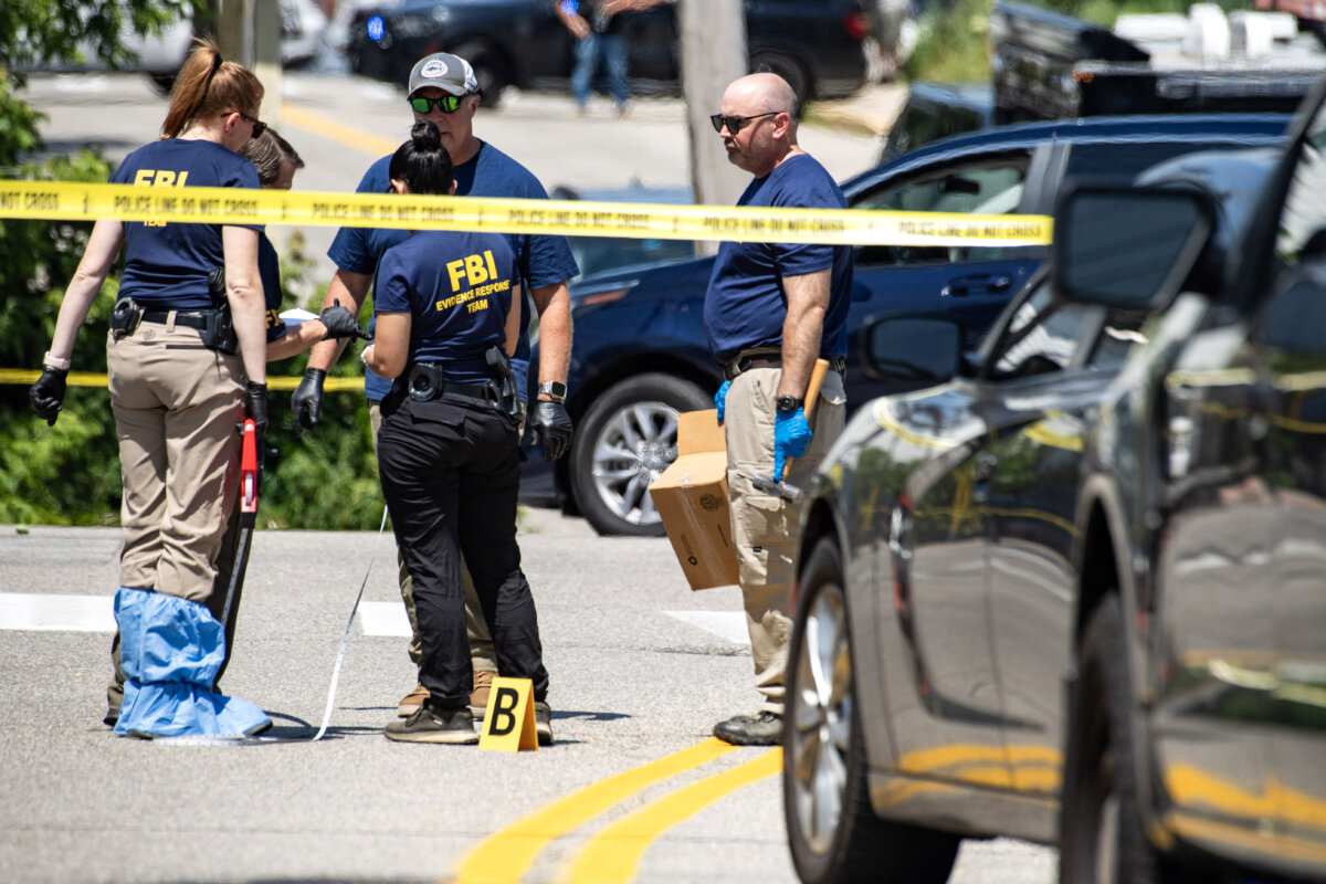 FBI investigators work the scene of an alleged ICE involved shooting in Biddeford, Maine, on July 13, 2026. (Joseph Prezioso/AFP)
