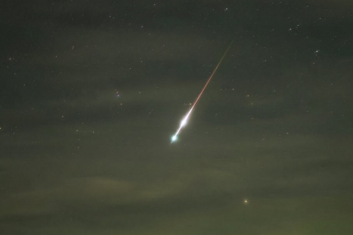 A Perseid fireball explodes over the Catskill Mountains, New York. (Courtesy of Garth Battista)