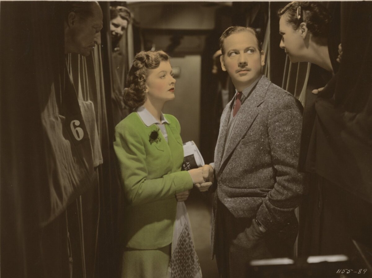 Margot Sherwood Merrick (Myrna Loy) and (Melvyn Douglas) in the aisle of a train, in “Third Finger Left Hand.” (Metro-Goldwyn-Mayer)