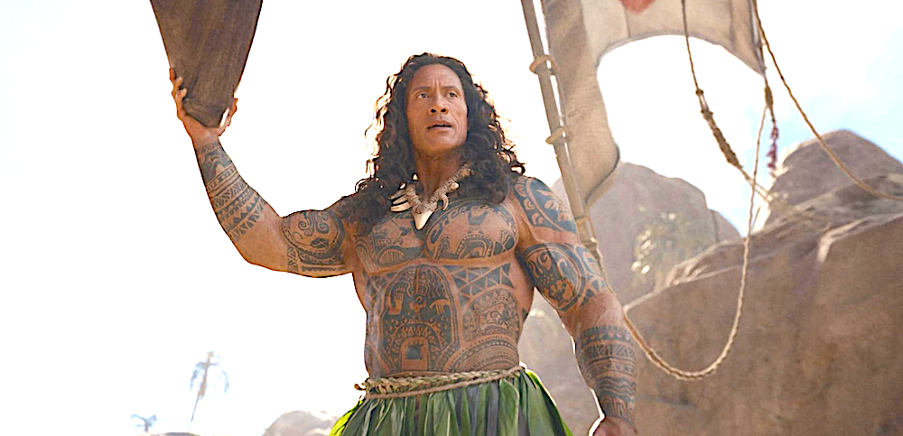 muscular man with tattoos and grass skirt in Moana