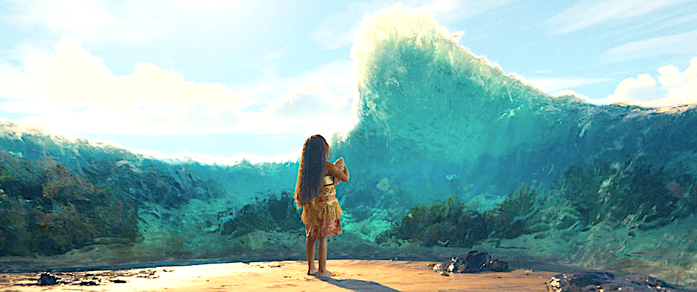 Young girl stands in front of a large wave in Moana