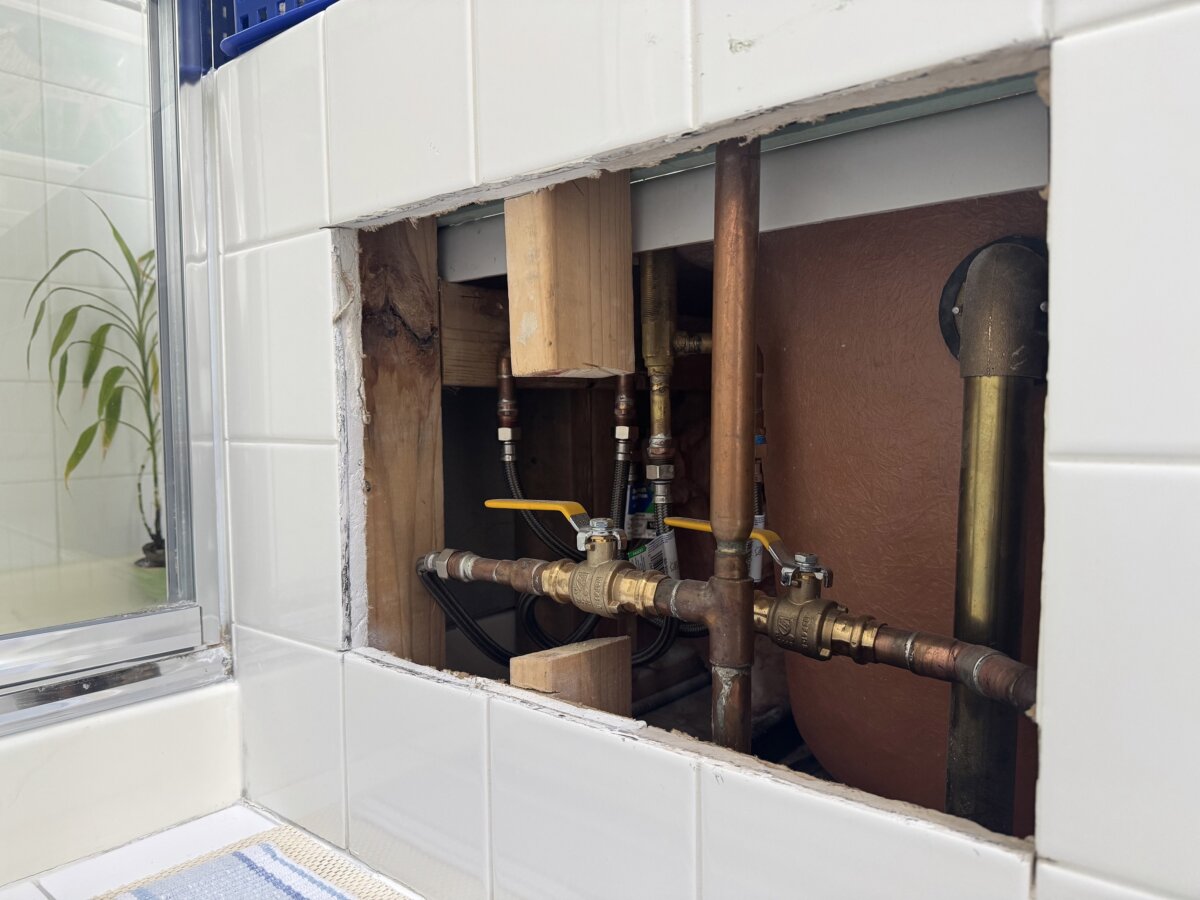 This short wall is next to a tub. A plumber cut out the tile to install a new faucet. The homeowner requested my help to design a decorative access panel. (Tim Carter/Tribune Content Agency/TNS)