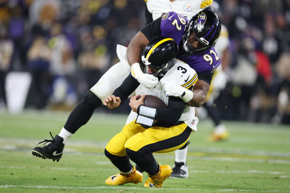 Nnamdi Madubuike #92 of the Baltimore Ravens sacks Russell Wilson #3 of the Pittsburgh Steelers during the third quarter during the AFC Wild Card Playoff at M&T Bank Stadium in Baltimore, Maryland, on Jan. 11, 2025 (Al Bello/Getty Images)