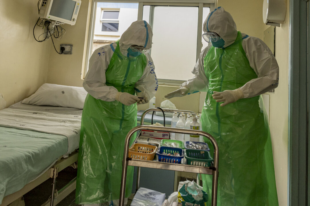 Nurses at the Kenyatta National Hospital in Nairobi, Kenya, train to receive a patient with a highly infectious disease during a simulation exercise on June 12, 2026. (Simon Maine/AFP via Getty Images)