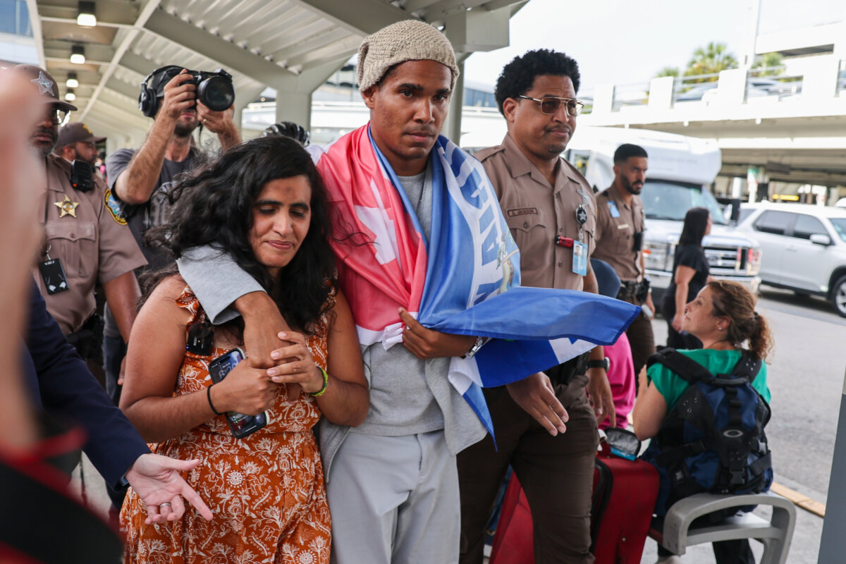After serving a five-year prison sentence in Cuba, Cuban dissident artist Luis Manuel Otero Alcántara arrives at Miami International Airport on July 18, 2026. (David Santiago /AP Photo)