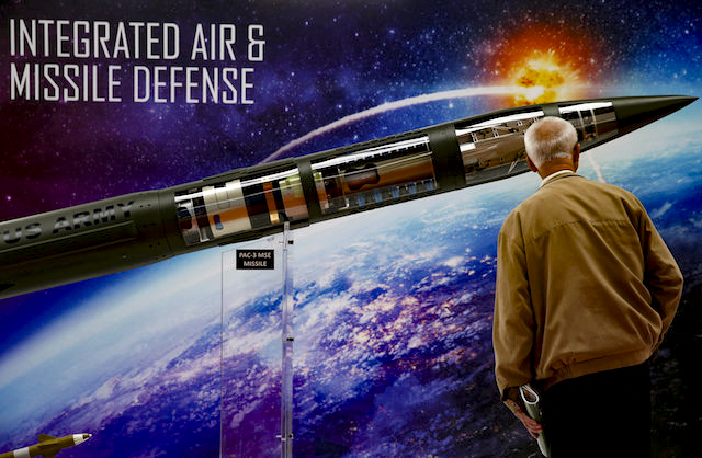 A man looks at a Patriot Advanced Capability (PAC-3) Missile Segment Enhancement (MSE) model by Lockheed Martin at an international military fair in Kielce, Poland Sept. 7, 2017. (REUTERS/Kacper Pempel/File Photo)