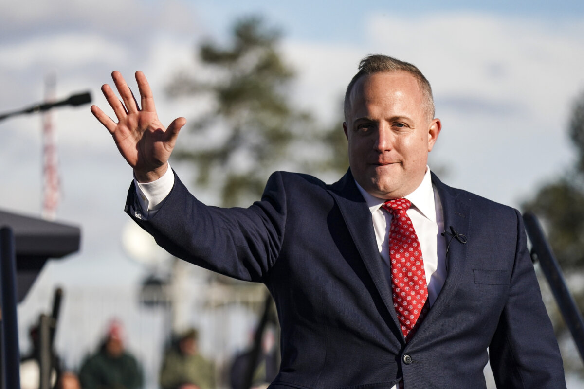 House candidate Russell Fry waves to a crowd during a rally with President Donald Trump at the Florence Regional Airport in Florence, S.C., on March 12, 2022. (Sean Rayford/Getty Images)