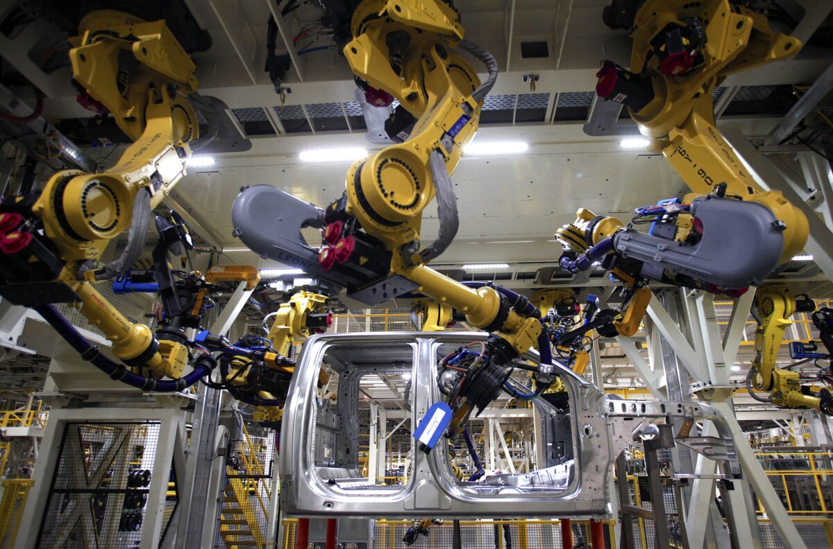 A 2015 Ford F-150 truck featuring a high-strength, military-grade, aluminum-alloy body and bed goes through the assembly line at the Ford Dearborn Truck Plant in Dearborn, Mich., on Nov. 11, 2014. (Bill Pugliano/Getty Images)