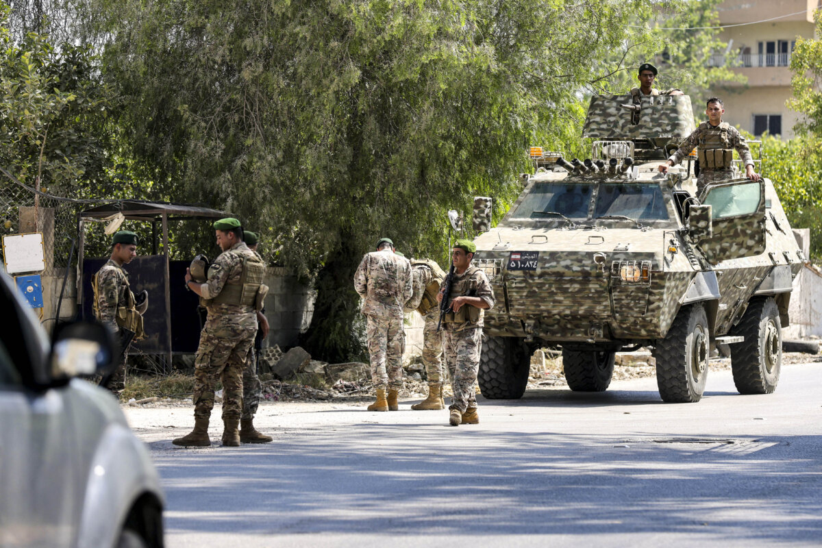 Lebanese soldiers gather on a road after deploying to the southern town of Srifa, Lebanon, on July 21, 2026. (Mahmoud Zayyat/AFP via Getty Images)