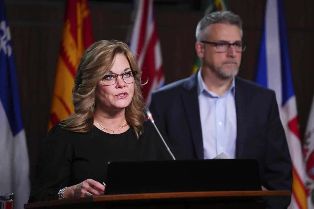 Canadian Coalition for Firearm Rights CEO Rod Giltaca and VP of Public Relations Tracey Wilson hold a press conference on Parliament Hill in Ottawa on Nov. 30, 2022. (The Canadian Press/Sean Kilpatrick)