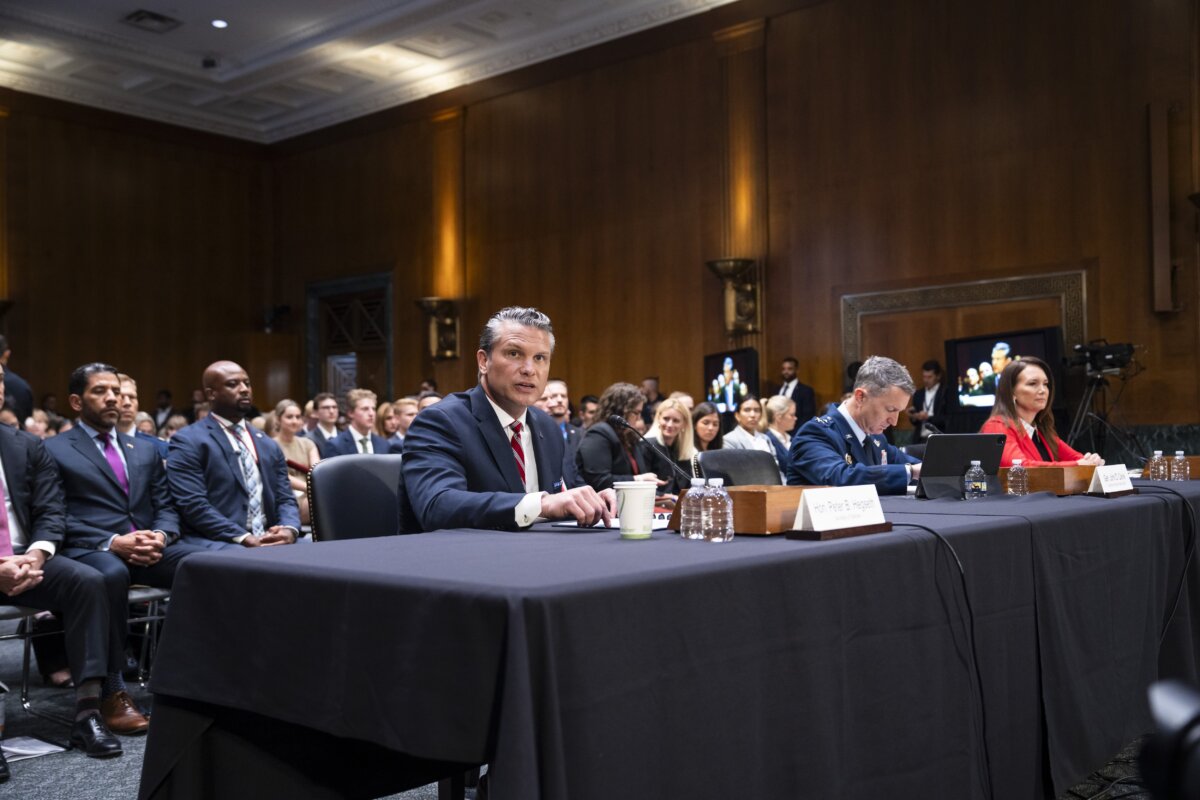 Secretary of War Pete Hegseth, Chairman of the Joint Chiefs of Staff Gen. Dan Caine, and Agriculture Secretary Brooke Rollins, testify before the Senate Committee on Appropriations in Washington on July 21, 2026.(Madalina Kilroy/The Epoch Times)