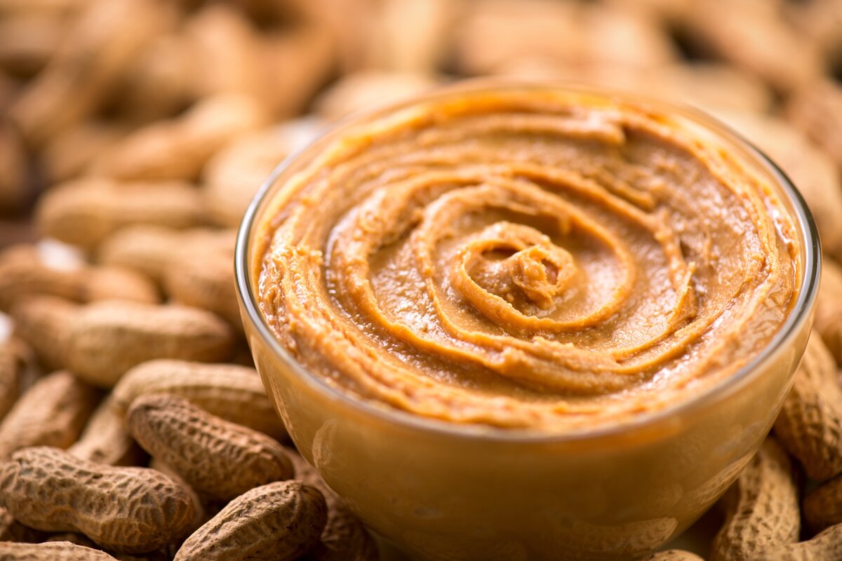 Natural peanut butter splits when it is stored and stirring can cause a mess. (Subbotina Anna/Shutterstock)