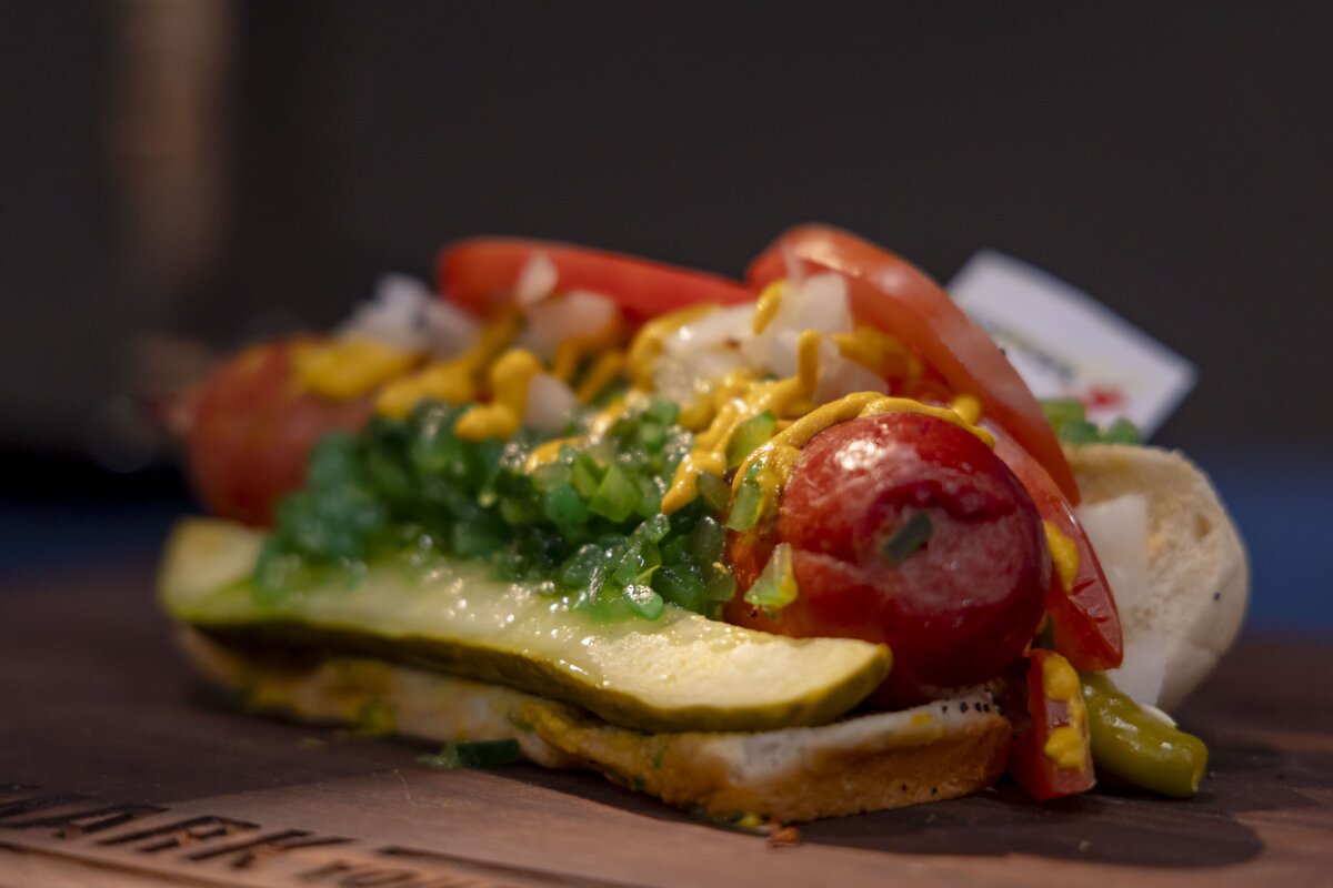 The FrankenWurst, a half-pound Vienna all-beef hot dog with slice tomatoes, yellow mustard, chopped onions, green relish, pickle spear, and sport peppers is seen at Soldier Field on Sept. 5, 2023. (Brian Cassella/Chicago Tribune/TNS)