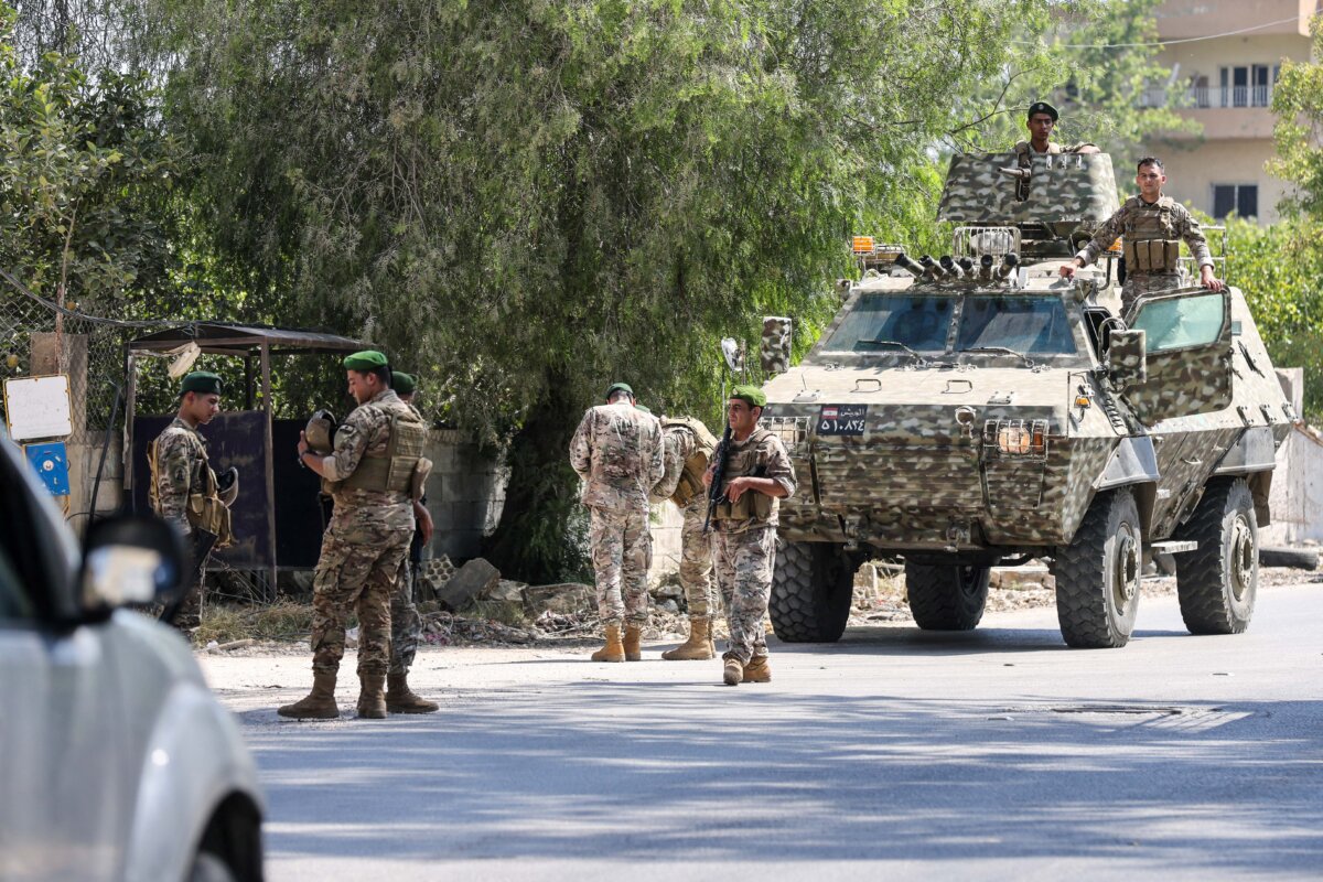 Lebanese soldiers gather on a road after deploying to the southern town of Srifa, on July 21, 2026. (Photo by Mahmoud Zayyat/AFP via Getty Images)