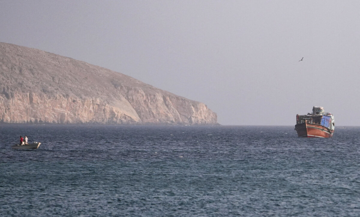 A vessel in the Strait of Hormuz, as seen from Musandam, Oman, on July 16, 2026. (Reuters/Stringer/File Photo)