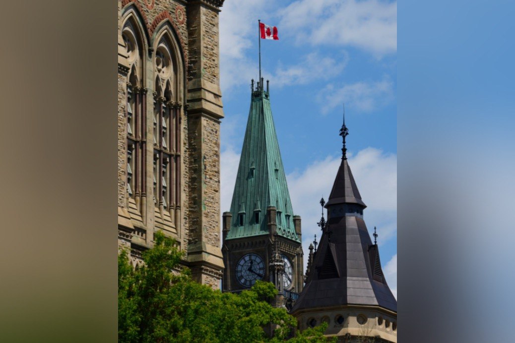 The flag flies on the Peace Tower on Parliament Hill in Ottawa on May 26, 2026. (The Canadian Press/Sean Kilpatrick)