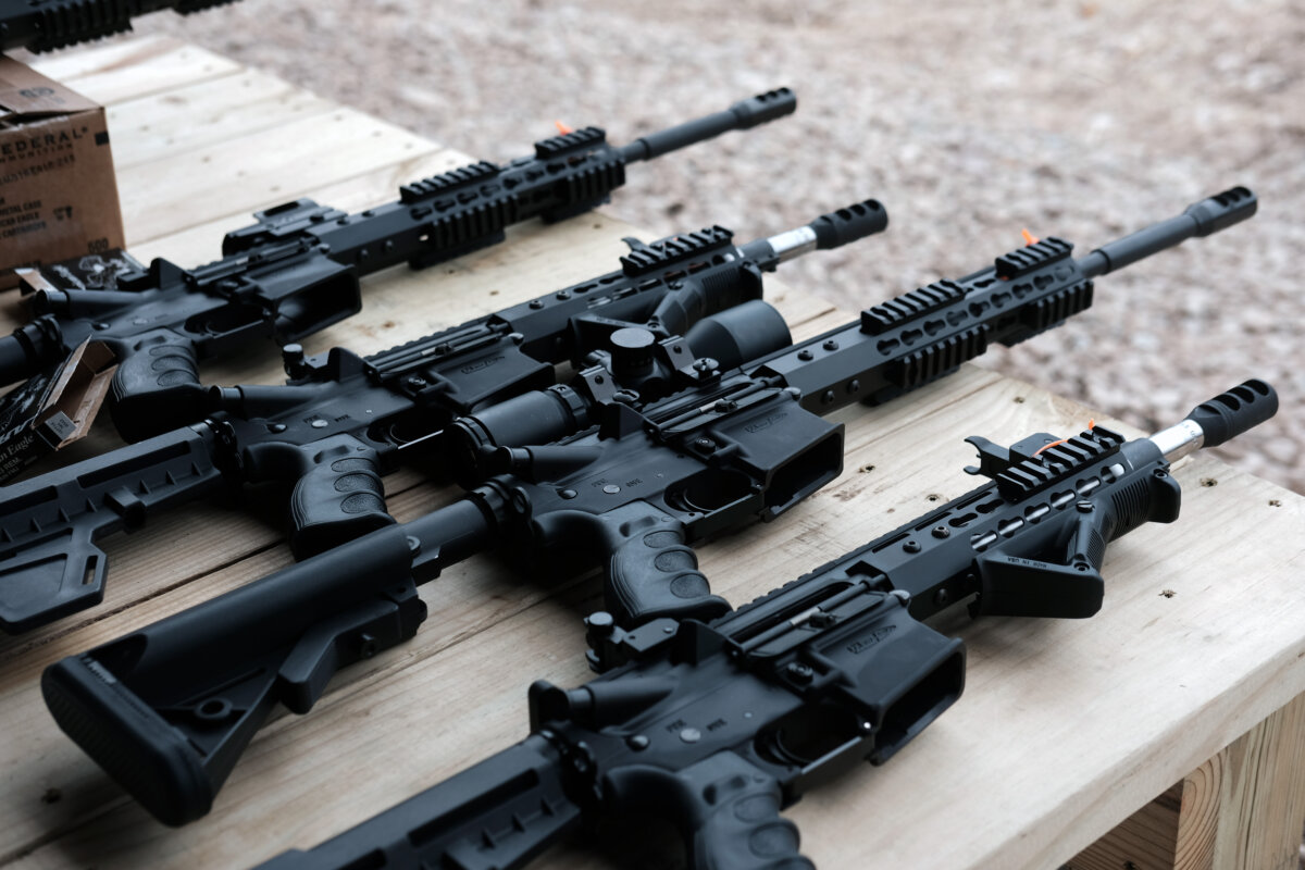 AR-15 rifles and other weapons are displayed on a table at a shooting range in Greeley, Pa., on Oct. 12, 2019. (Spencer Platt/Getty Images)