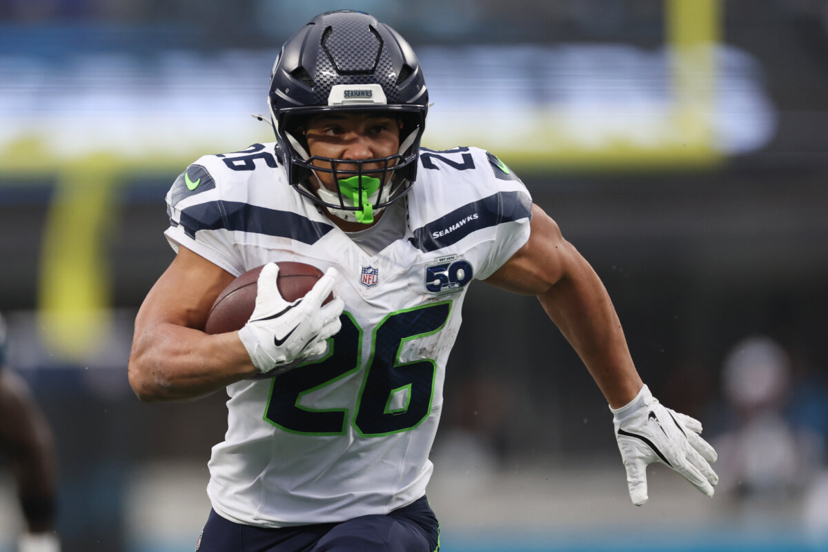 Zach Charbonnet of the Seattle Seahawks runs with the ball during the third quarter against the Carolina Panthers at Bank of America Stadium in Charlotte, N.C., on Dec. 28, 2025. (David Jensen/Getty Images)