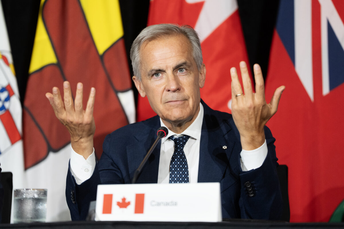 Prime Minister Mark Carney answers questions from reporters during the closing press conference at the First Ministers Meetings in Charlottetown on July 23, 2026. (The Canadian Press/Darren Calabrese)