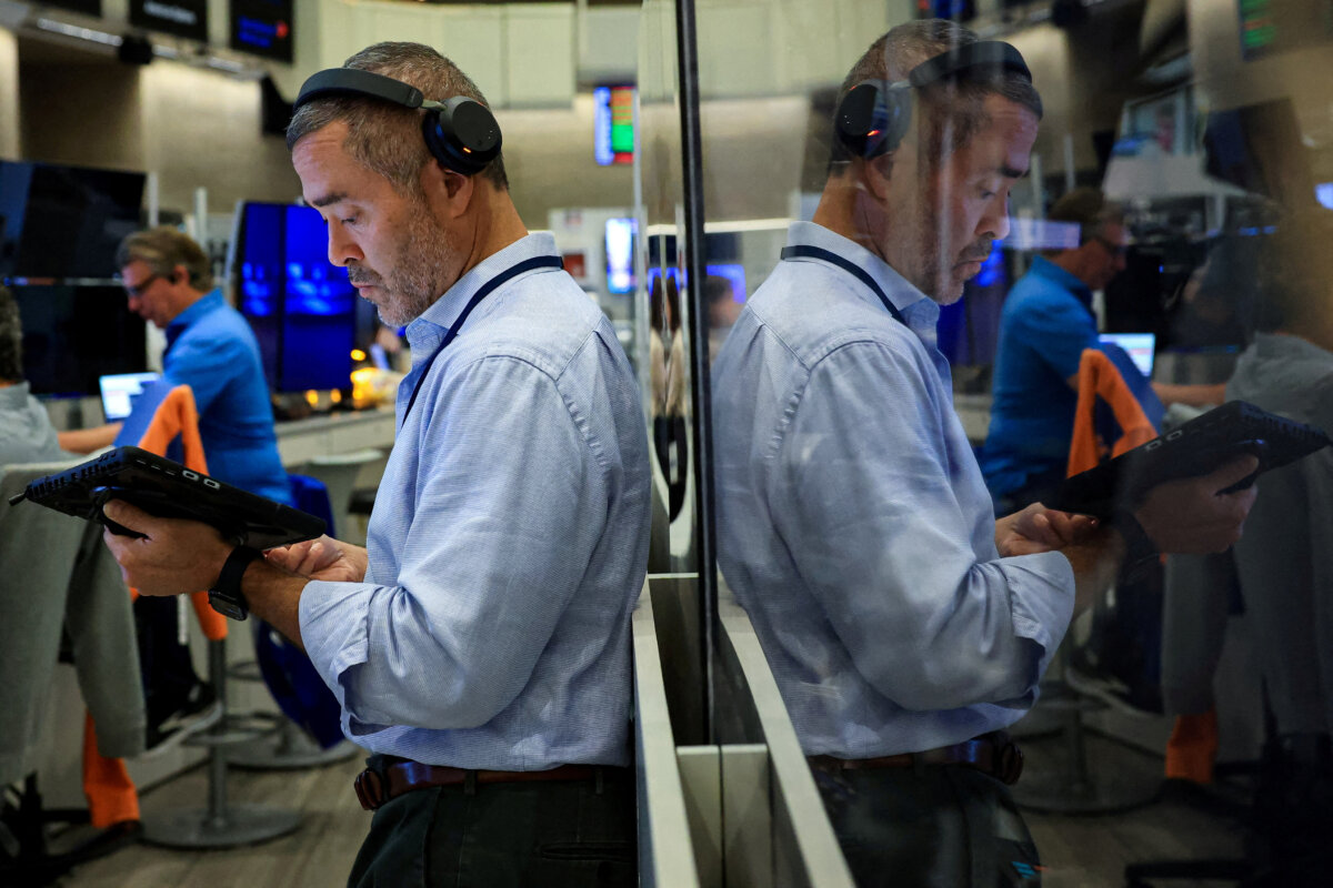 FILE PHOTO: Futures-options traders work on the floor at the New York Stock Exchange's NYSE American (AMEX) in New York City, U.S. July 16, 2026. (Brendan McDermid/REUTERS)