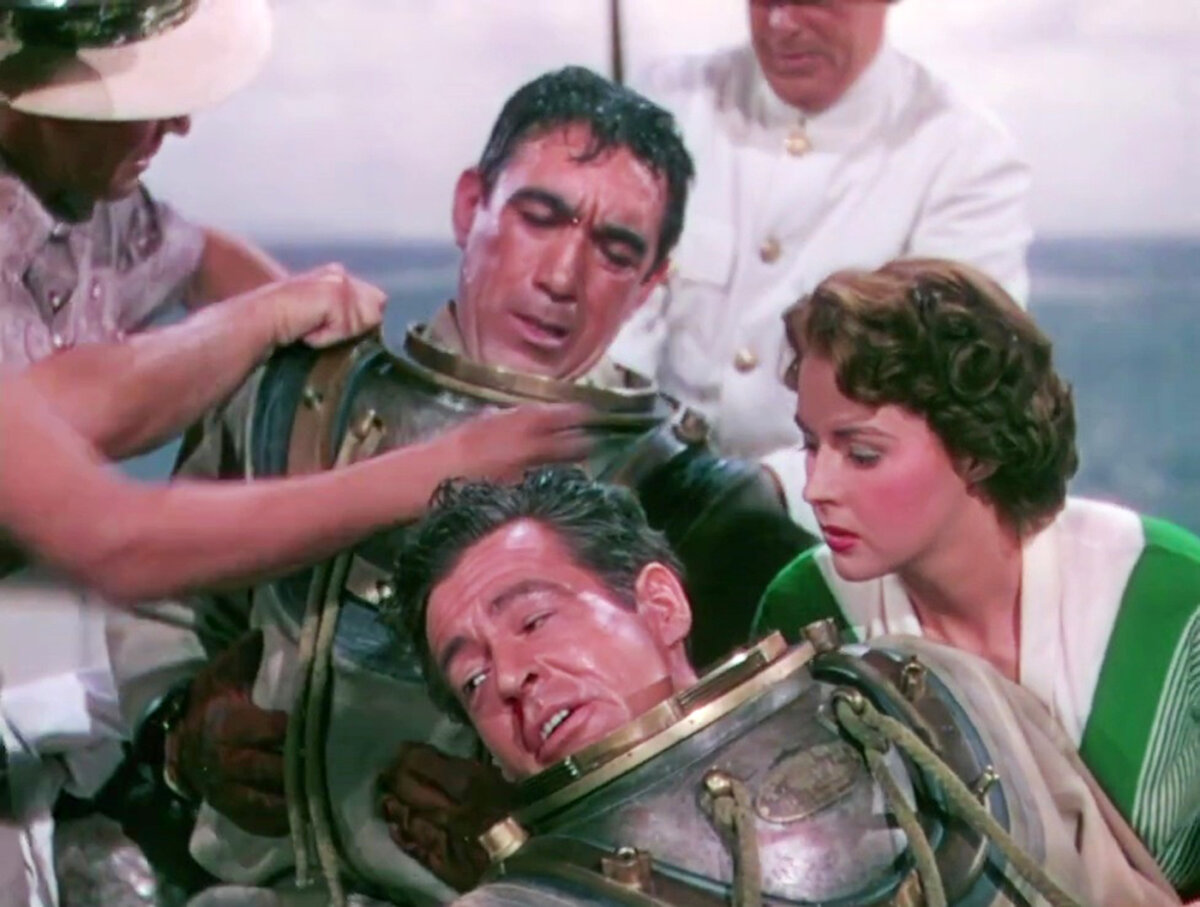 (L–R) Tony Bartlett (Anthony Quinn), Brad Carlton (Robert Ryan), and Terry McBride (Mala Powers), in “City Beneath the Sea.” (GJW+)