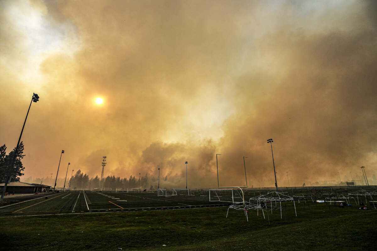 The Old Trails Fire is seen from Dwight Merkel Sports Complex, in Spokane, Wash., on Aug. 1, 2026. (Young Kwak/AP Photo)