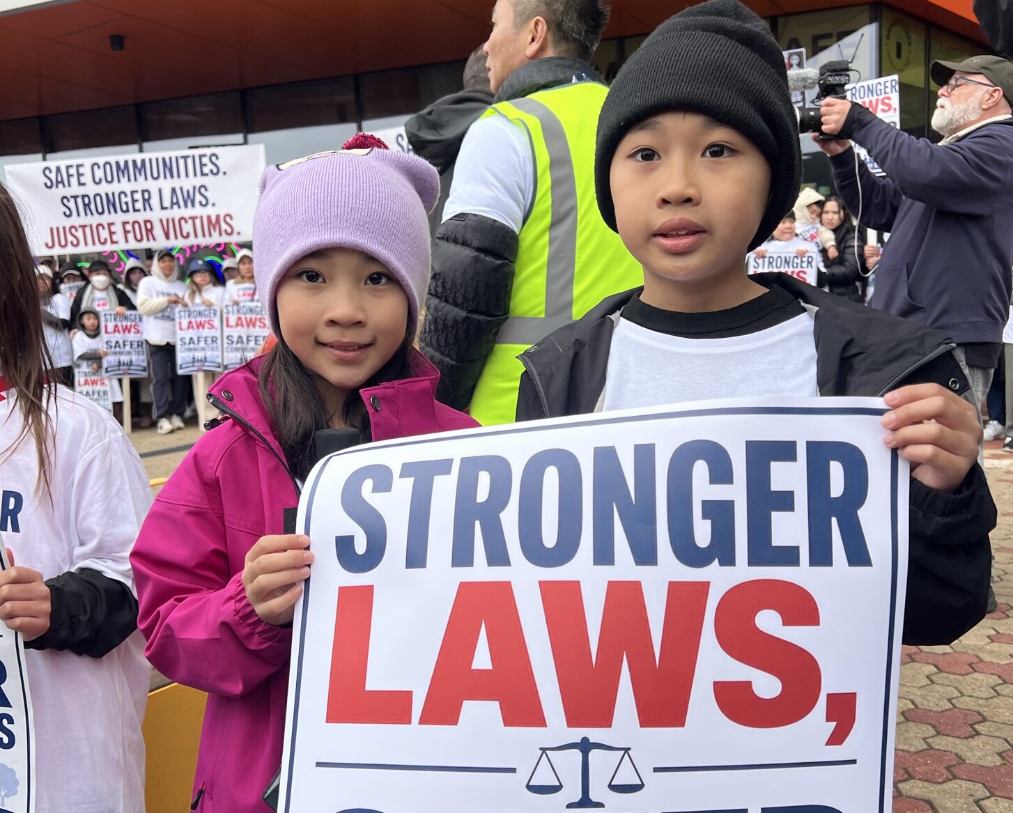 Kids hold banner