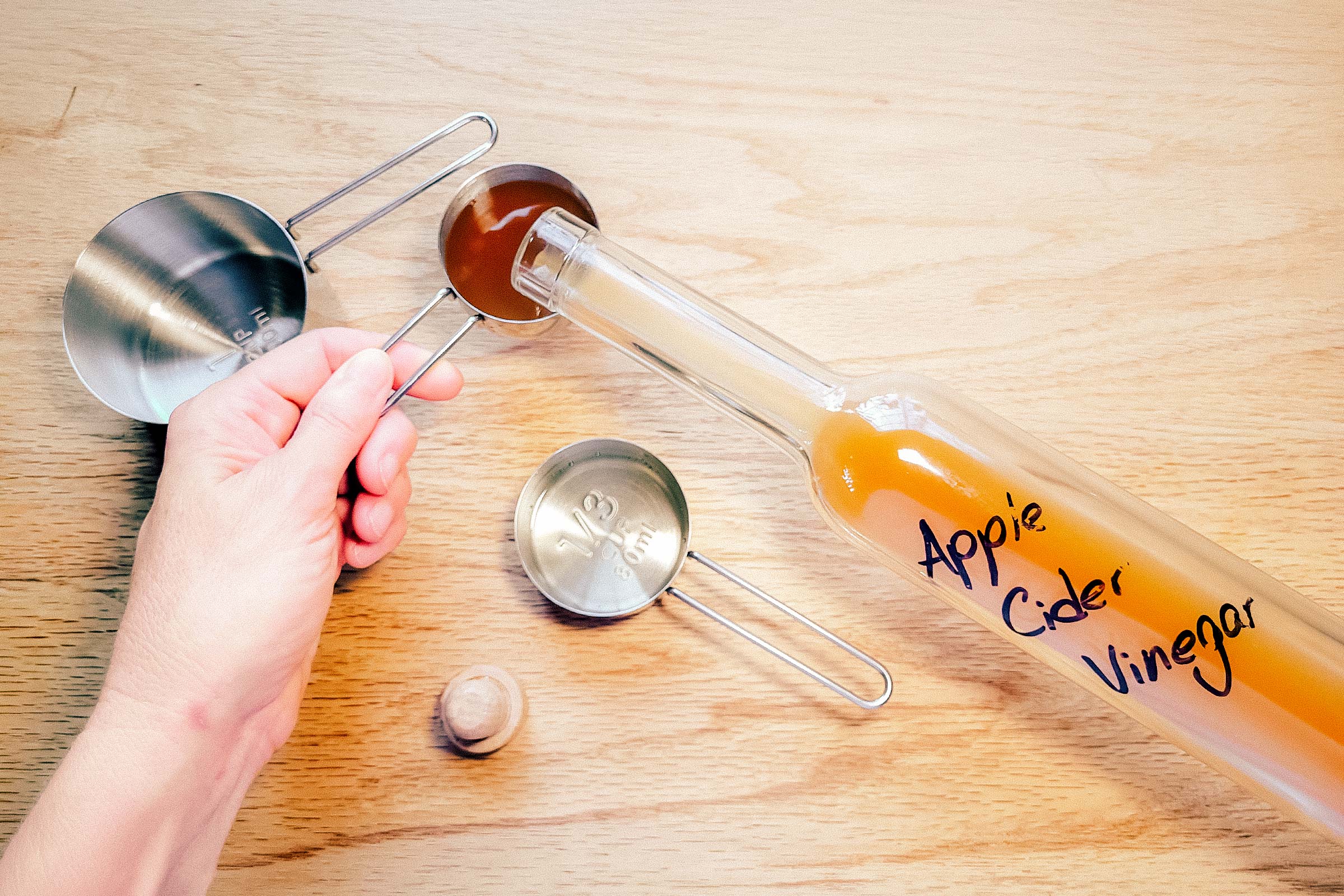 6067460-Mixing-Apple-Cider-Vinegar-Rinse