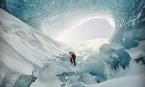 ‘Another World’: Photographer Explores Giant Ice Caves in the Belly of a Glacier—And The Photos Are Surreal