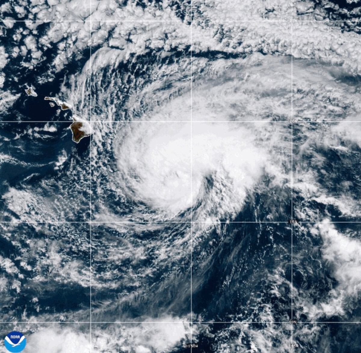 This NOAA satellite image taken at 5:22 p.m. ET on Aug. 14, 2026, shows Tropical Storm Lala as it approaches Hawaii's Big Island. (NOAA via AP)