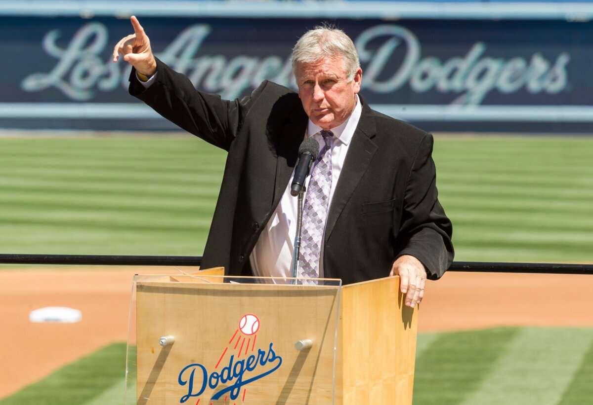Los Angeles Dodgers former pitcher Tommy John praises his late friend, Dr. Frank Jobe during a memorial service at Dodger Stadium in Los Angeles on April 7, 2014. (Damian Dovarganes/AP Photo)